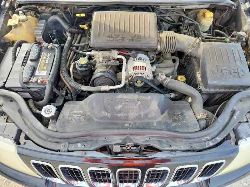 Photo 12 from auction – 2002 JEEP GRAND CHEROKEE with VIN 1J8GW58N72C129163