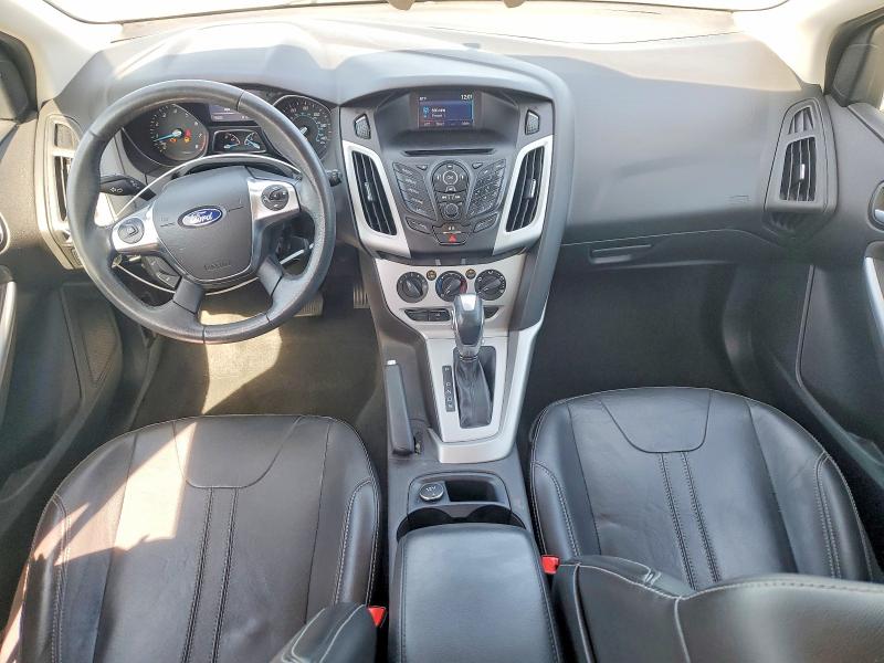 Photo 8 from auction – 2014 FORD FOCUS with VIN 1FADP3K22EL454260