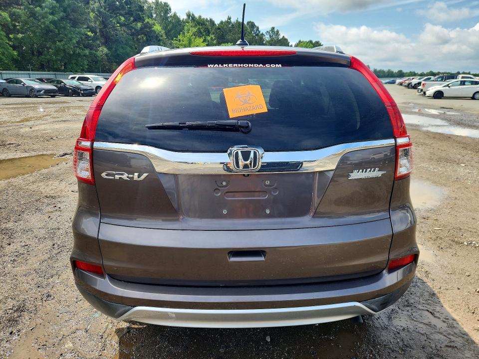 Photo 6 from auction – 2015 HONDA CR-V with VIN 2HKRM3H76FH539197