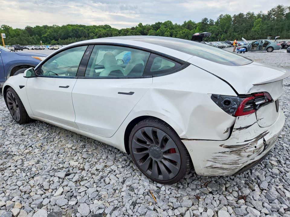Photo 2 from auction – 2021 TESLA MODEL 3 with VIN 5YJ3E1EC2MF020233