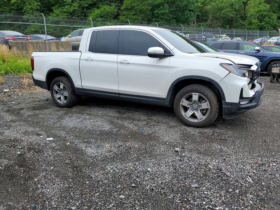 Photo 4 from auction – 2025 HONDA RIDGELINE with VIN 5FPYK3F56SB037289