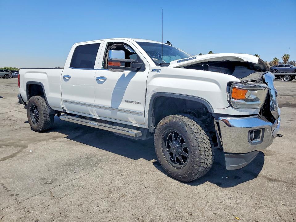 Photo 4 from auction – 2018 GMC SIERRA with VIN 1GT12TEY9JF125298