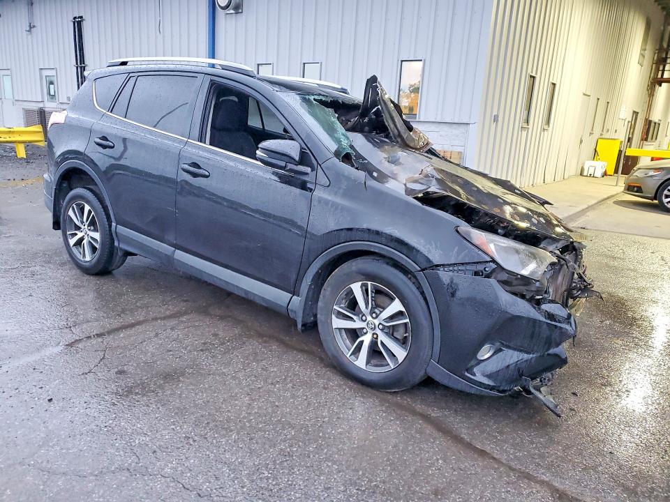 Photo 4 from auction – 2018 TOYOTA RAV4 with VIN 2T3RFREV8JW845089