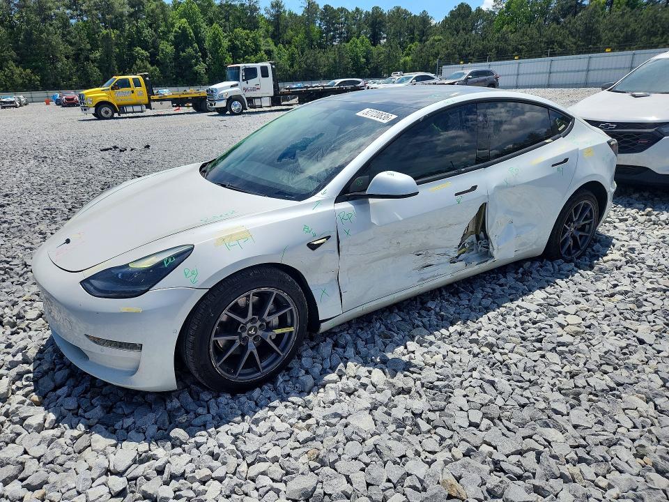 TESLA MODEL 3 2021 with VIN 5YJ3E1EA4MF877927 - Photo from auction