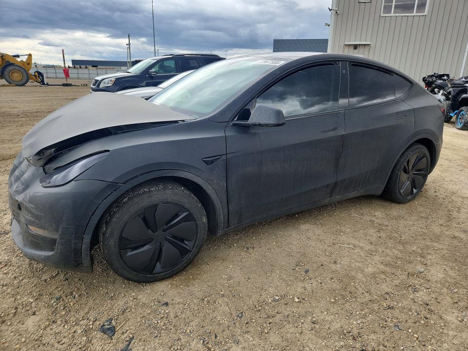 TESLA MODEL Y 2023 with VIN LRWYGDFD3PC057864 - Photo from auction