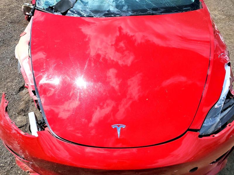 Photo 11 from auction – 2022 TESLA MODEL 3 with VIN 5YJ3E1EA2NF187773