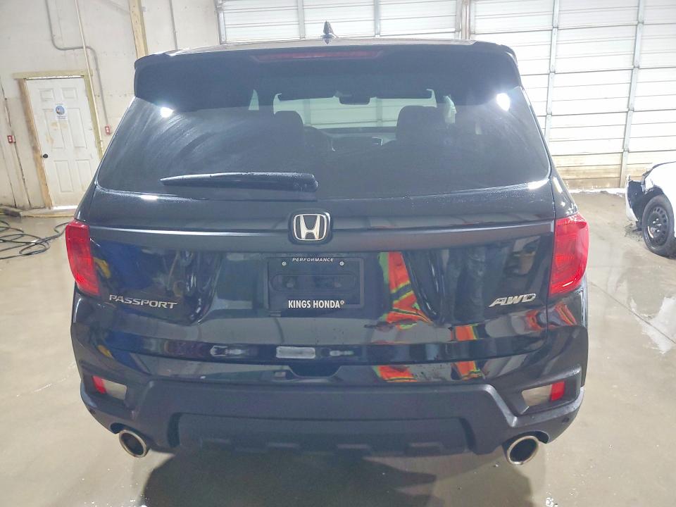 Photo 6 from auction – 2023 HONDA PASSPORT with VIN 5FNYF8H57PB003991