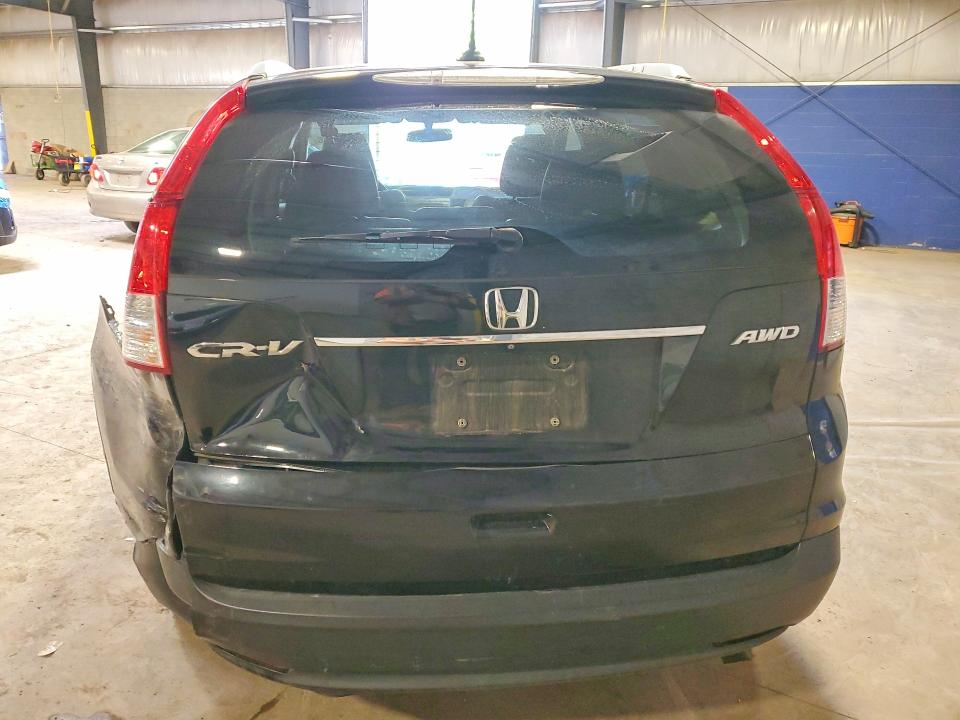 Photo 6 from auction – 2014 HONDA CR-V with VIN 2HKRM4H74EH673811