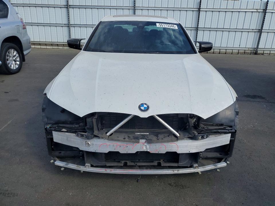 Photo 5 from auction – 2020 BMW 330I with VIN 3MW5R1J00L8B20341