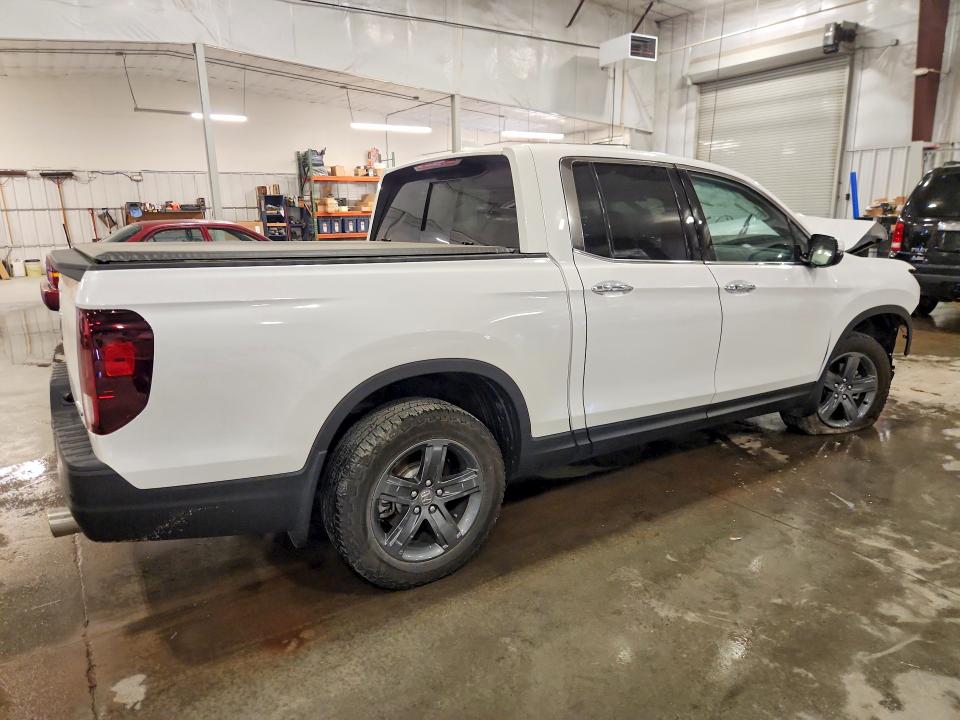 Photo 3 from auction – 2023 HONDA RIDGELINE with VIN 5FPYK3F75PB057655