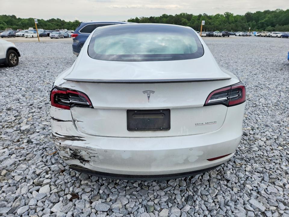 Photo 6 from auction – 2021 TESLA MODEL 3 with VIN 5YJ3E1EC2MF020233