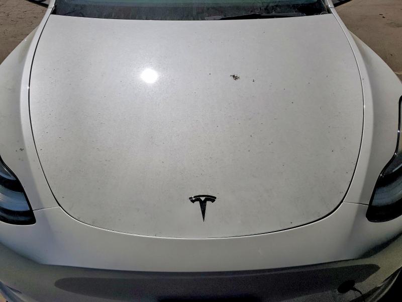 Photo 11 from auction – 2023 TESLA MODEL Y with VIN 7SAYGDEE9PA023010