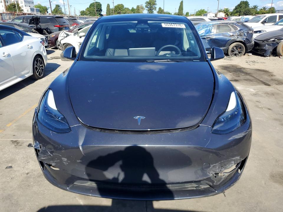 Photo 5 from auction – 2023 TESLA MODEL Y with VIN 7SAYGDED3PF941314