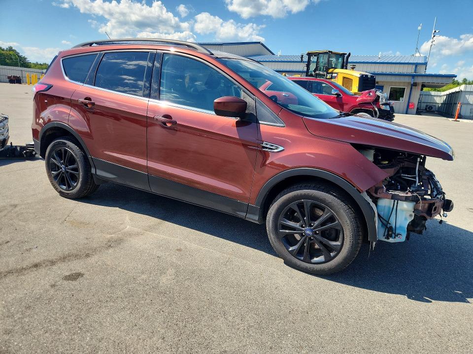 Photo 4 from auction – 2018 FORD ESCAPE with VIN 1FMCU9GD3JUA12468