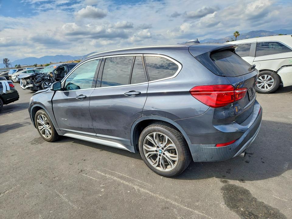 Photo 2 from auction – 2016 BMW X1 with VIN WBXHT3Z32G4A47743