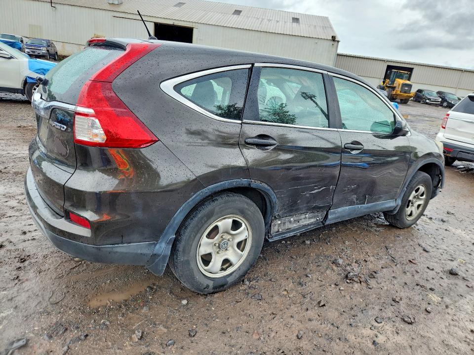 Photo 3 from auction – 2015 HONDA CR-V with VIN 5J6RM4H34FL012946