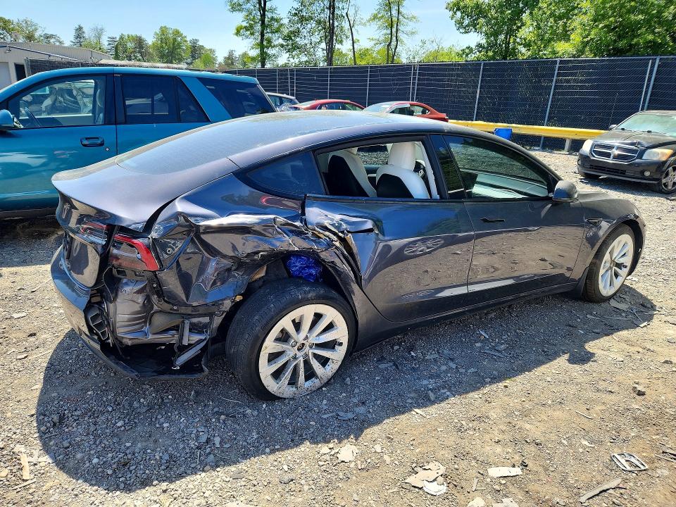 Photo 3 from auction – 2021 TESLA MODEL 3 with VIN 5YJ3E1EA9MF987274