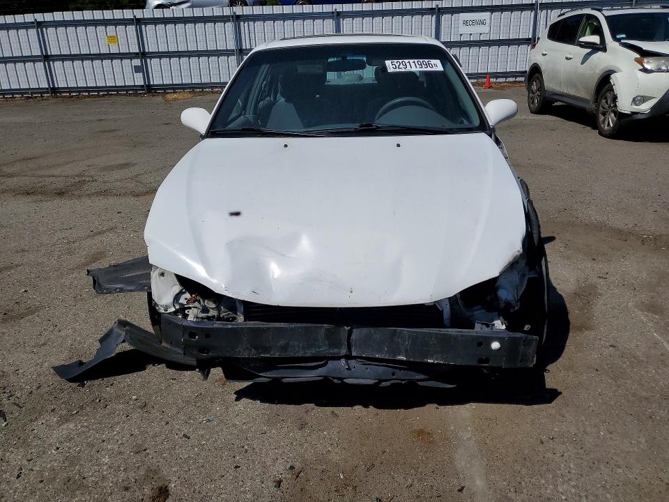 Photo 5 from auction – 2002 TOYOTA COROLLA with VIN 1NXBR12E32Z643205
