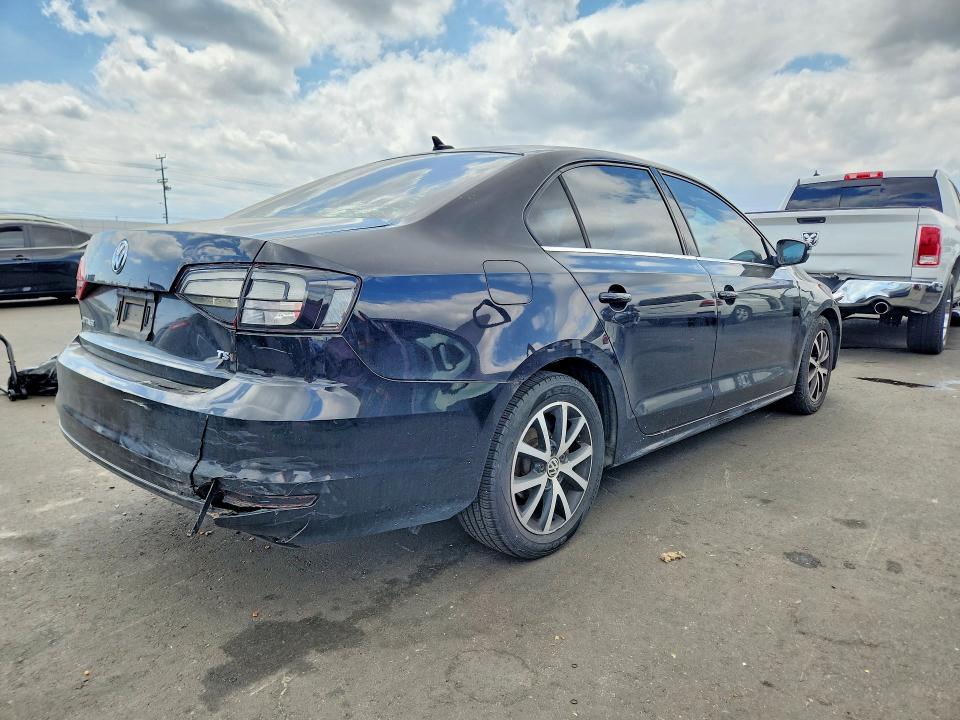 Photo 3 from auction – 2017 VOLKSWAGEN JETTA with VIN 3VWDB7AJ9HM328891