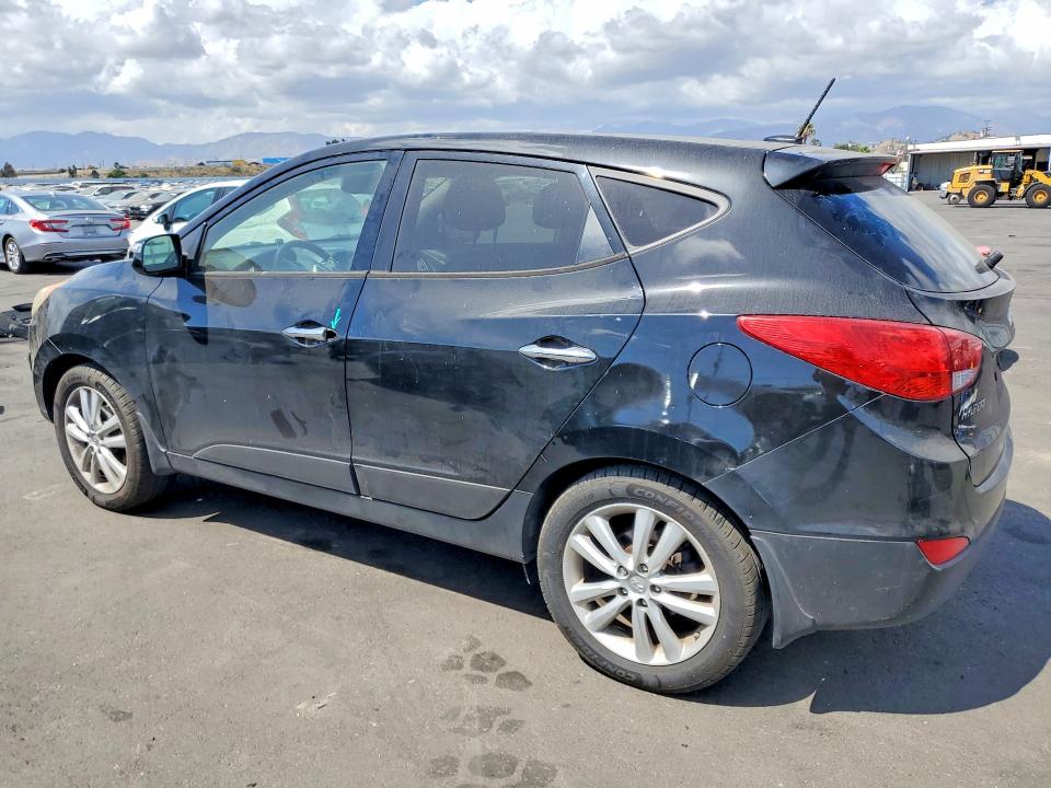 Photo 2 from auction – 2012 HYUNDAI TUCSON with VIN KM8JUCAC3CU510239