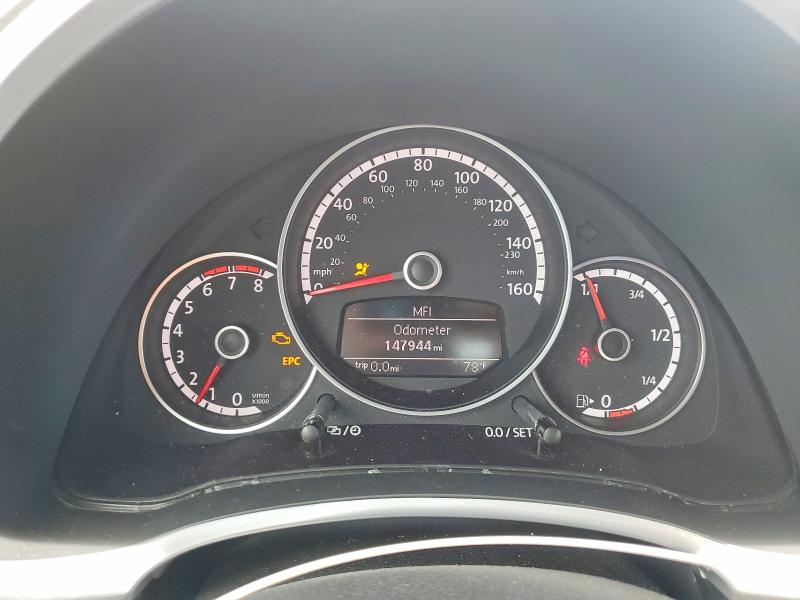 Photo 9 from auction – 2014 VOLKSWAGEN BEETLE with VIN 3VWVT7AT6EM662472