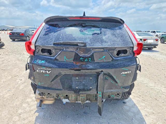 Photo 6 from auction – 2018 HONDA CR -V with VIN 7FARW2H58JE048578