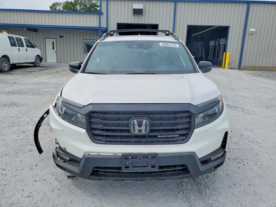 Photo 5 from auction – 2023 HONDA RIDGELINE with VIN 5FPYK3F86PB006464