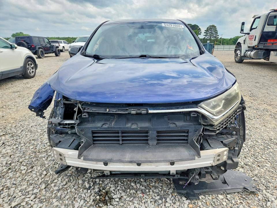 Photo 5 from auction – 2017 HONDA CR-V with VIN 7FARW5H39HE010058