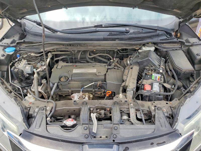 Photo 11 from auction – 2015 HONDA CR-V with VIN 2HKRM4H5XFH707489