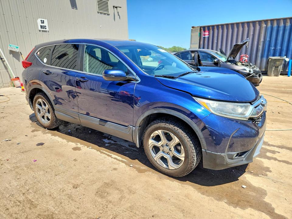 Photo 4 from auction – 2018 HONDA CR-V with VIN 7FARW2H83JE053004