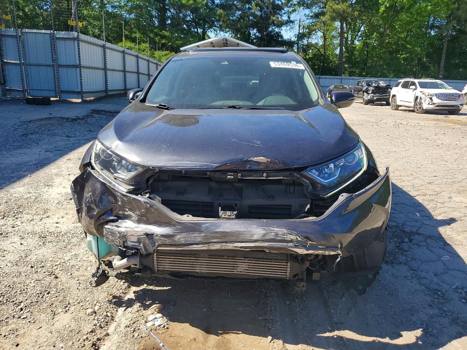 Photo 5 from auction – 2017 HONDA CR-V with VIN 7FARW1H51HE031304