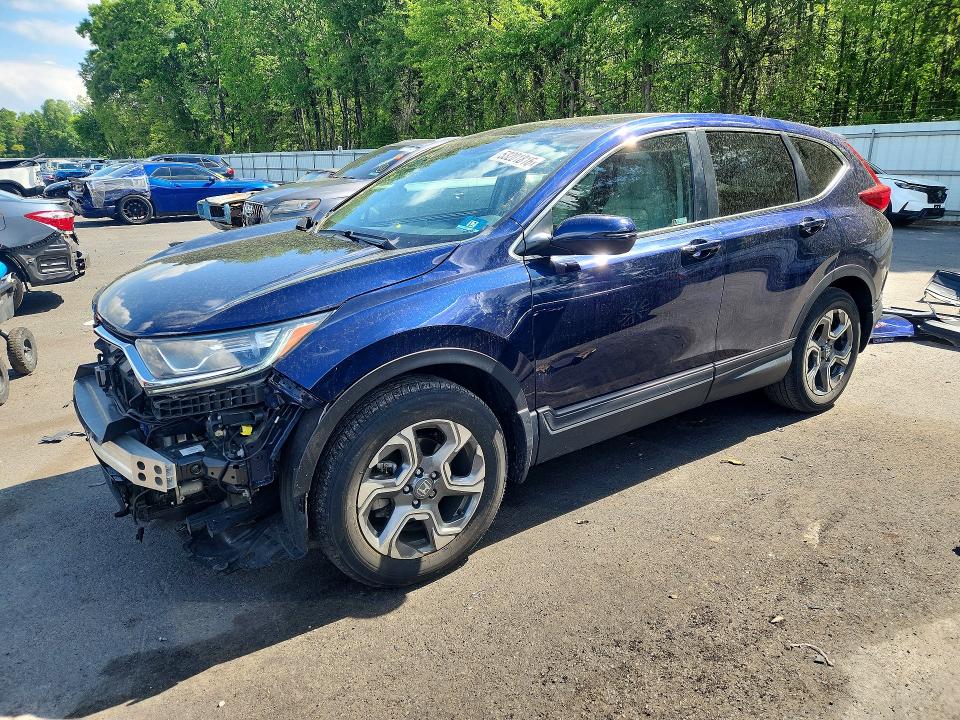 Photo 1 from auction – 2018 HONDA CR-V with VIN 2HKRW2H5XJH700226