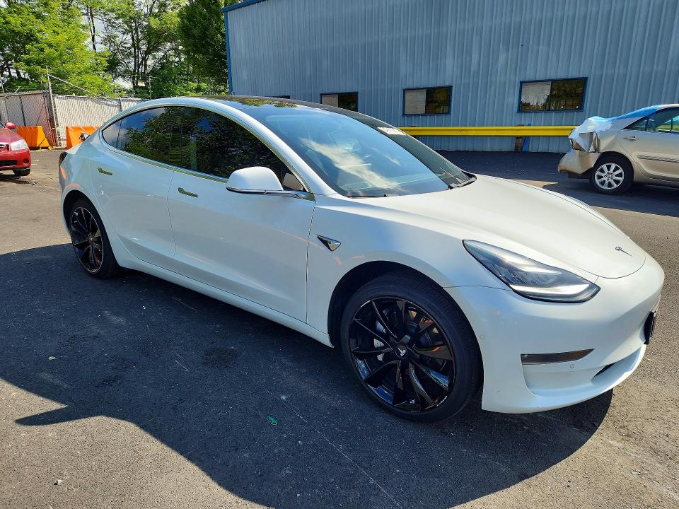 Photo 4 from auction – 2018 TESLA MODEL 3 with VIN 5YJ3E1EA3JF035821