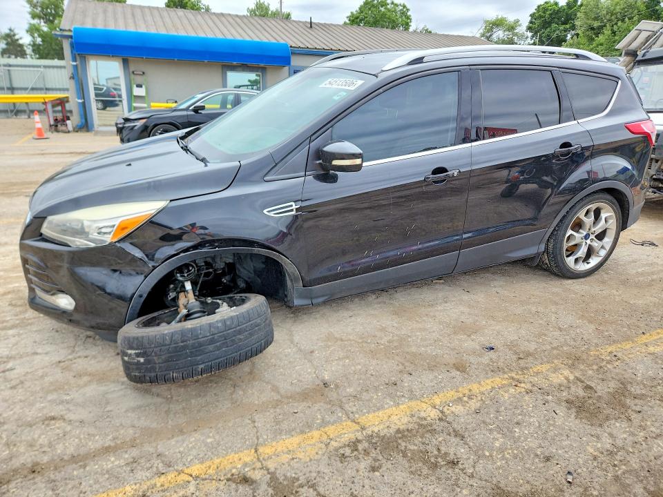 FORD ESCAPE 2015 with VIN 1FMCU0JX1FUA17335 - Photo from auction