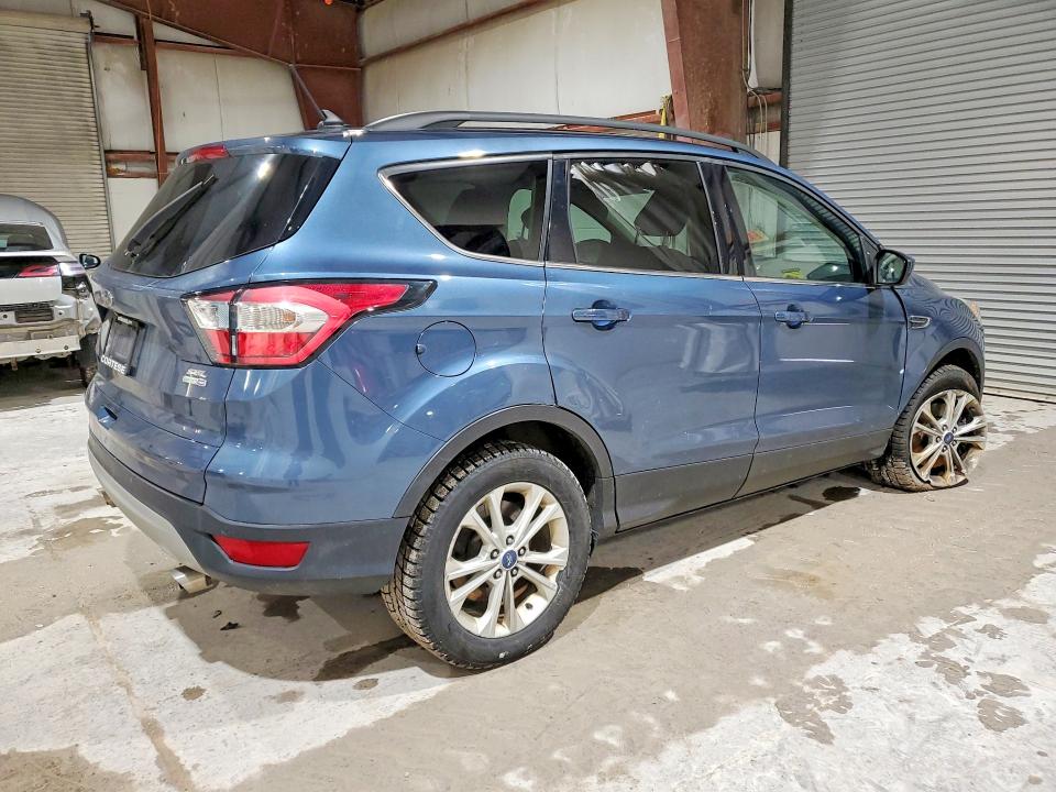 Photo 3 from auction – 2018 FORD ESCAPE with VIN 1FMCU9HD5JUA02829
