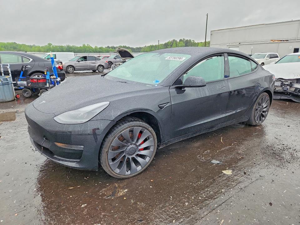 TESLA MODEL 3 2023 with VIN 5YJ3E1EC9PF414235 - Photo from auction