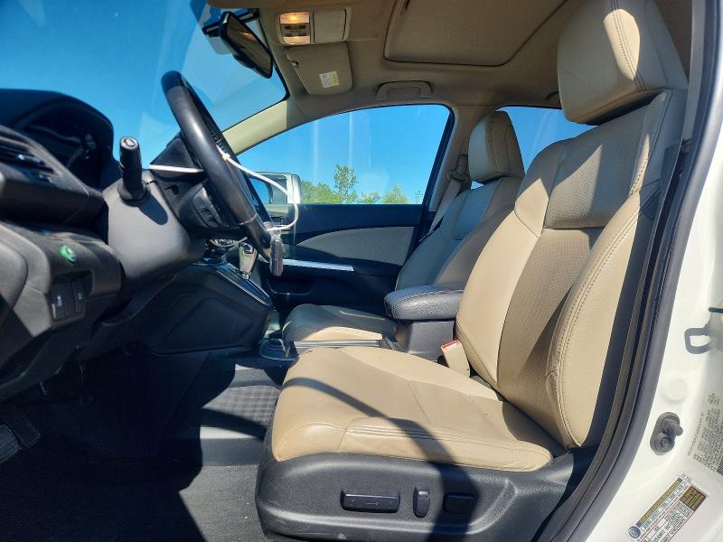 Photo 7 from auction – 2016 HONDA CR-V with VIN 5J6RM4H79GL049141