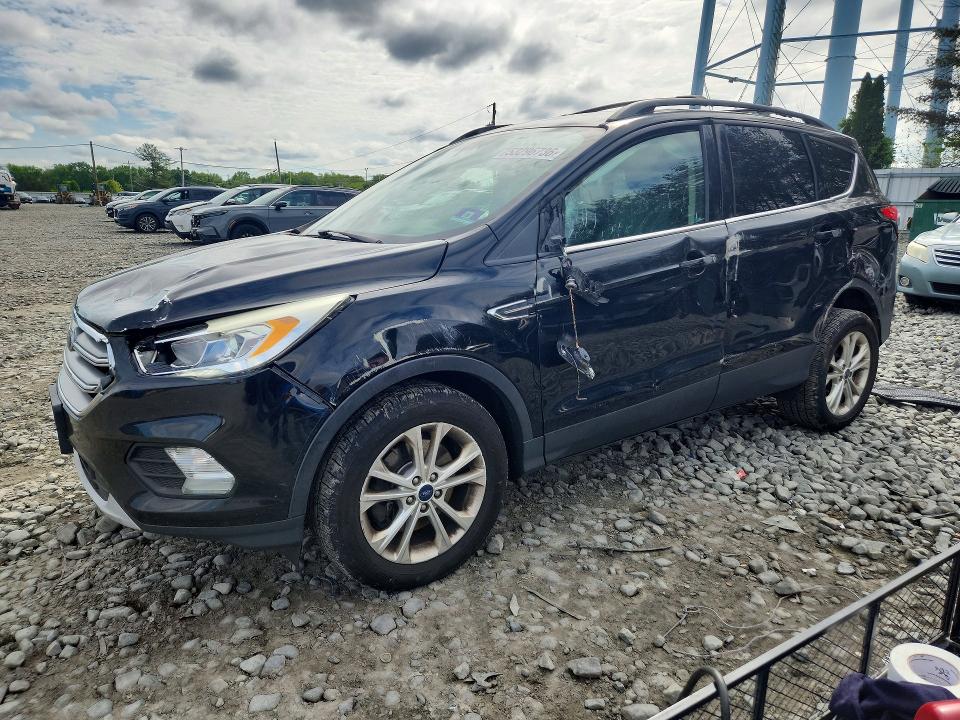 FORD ESCAPE 2017 with VIN 1FMCU9G91HUD71632 - Photo from auction