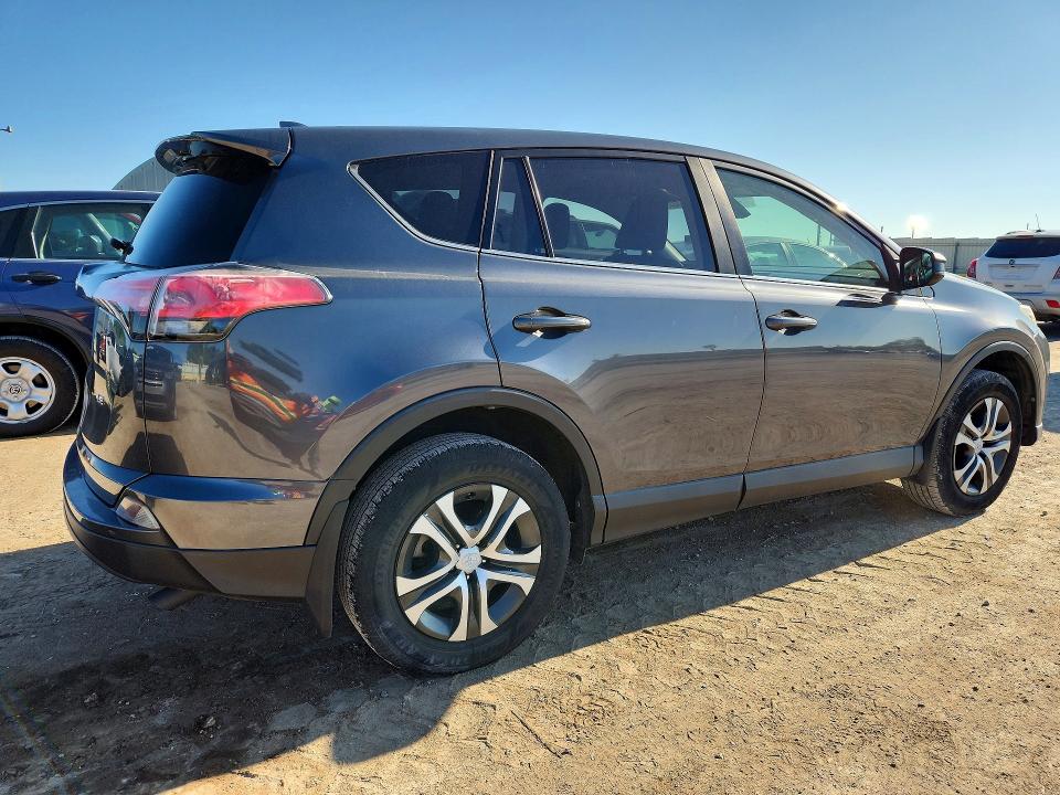 Photo 3 from auction – 2018 TOYOTA RAV4 with VIN JTMZFREV5JD109675