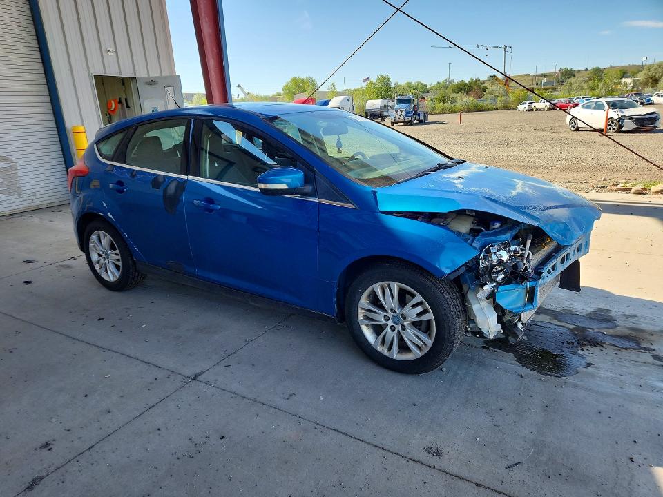 Photo 4 from auction – 2012 FORD FOCUS with VIN 1FAHP3M25CL162422