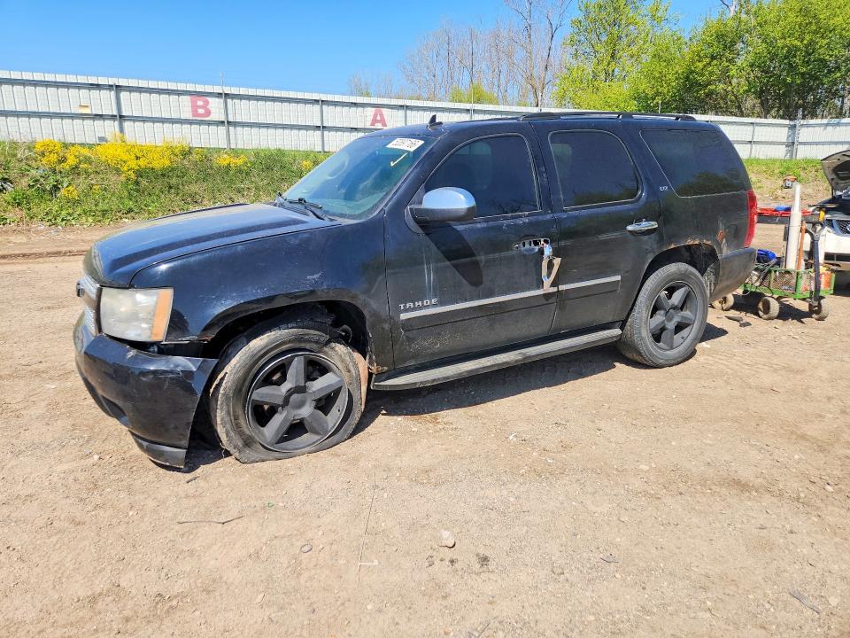 CHEVROLET TAHOE 2011 with VIN 1GNSKCE05BR206594 - Photo from auction