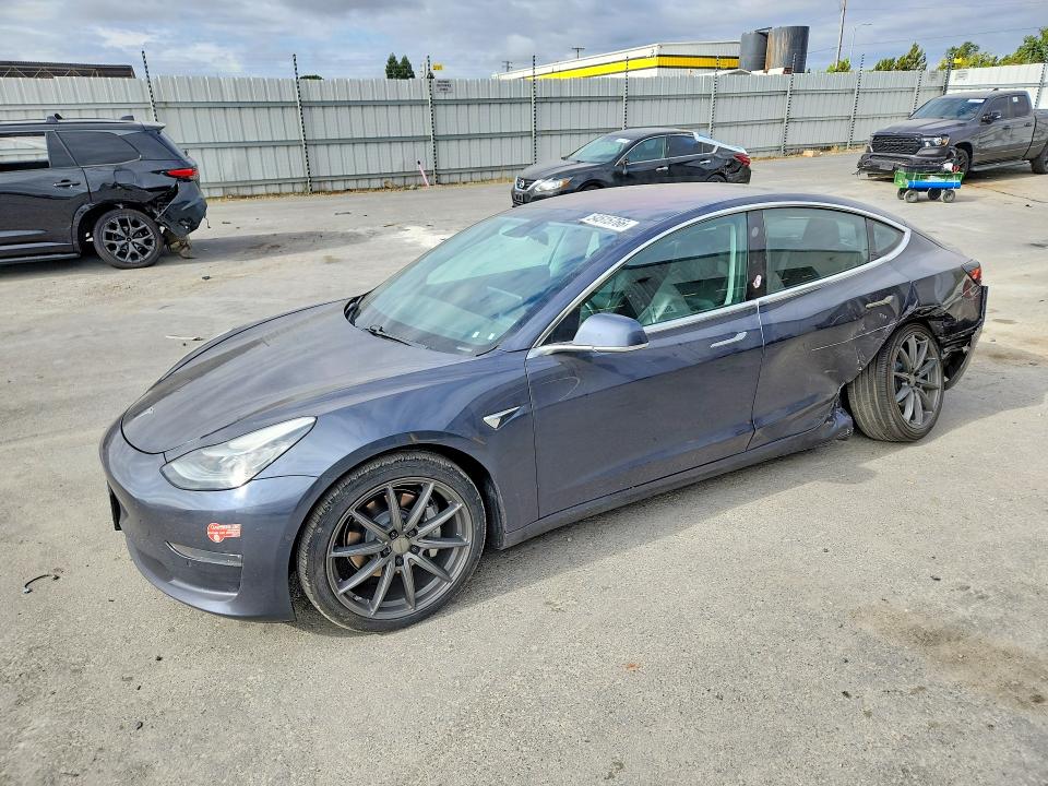 TESLA MODEL 3 2018 with VIN 5YJ3E1EAXJF046461 - Photo from auction