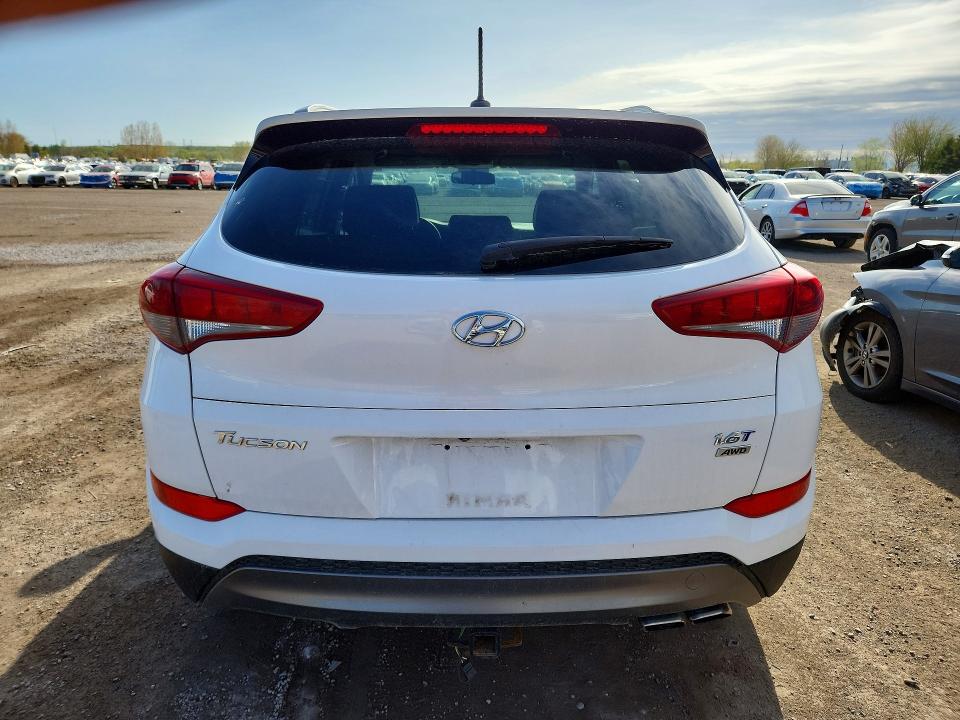 Photo 6 from auction – 2016 HYUNDAI TUCSON with VIN KM8J3CA28GU058272