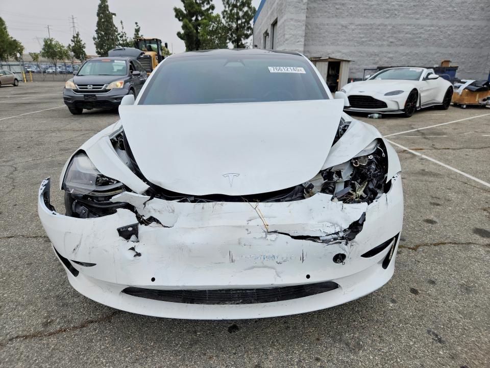 Photo 5 from auction – 2021 TESLA MODEL 3 with VIN 5YJ3E1EA0MF070675