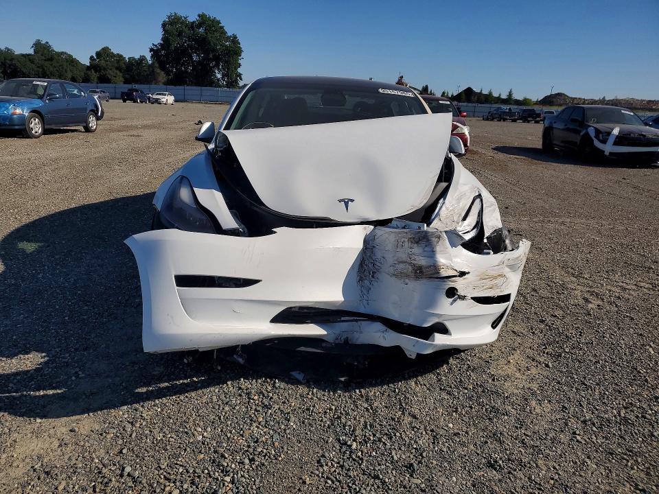 Photo 5 from auction – 2022 TESLA MODEL 3 with VIN 5YJ3E1EA6NF362039