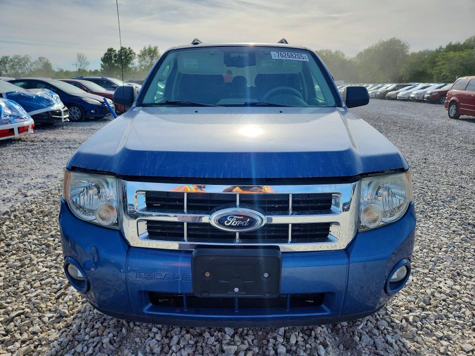 Photo 5 from auction – 2009 FORD ESCAPE with VIN 1FMCU03769KB87428