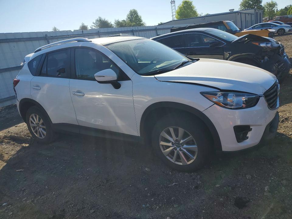 Photo 4 from auction – 2016 MAZDA CX-5 with VIN JM3KE4CY9G0762666