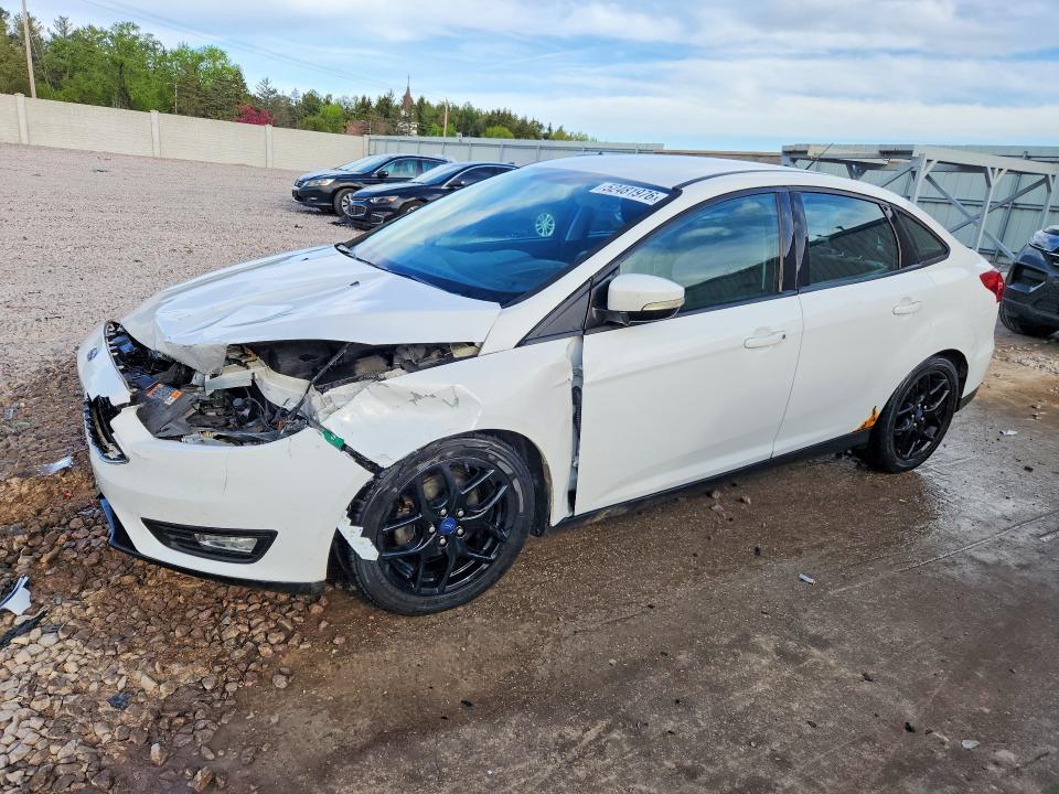 FORD FOCUS 2016 with VIN 1FADP3F25GL299720 - Photo from auction