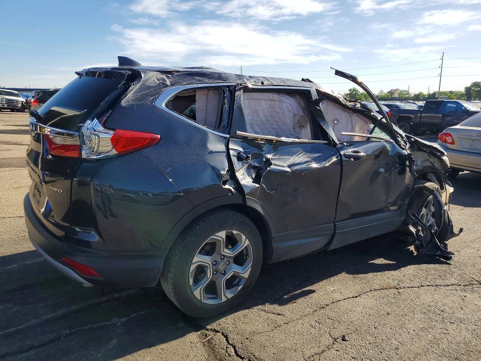 Photo 3 from auction – 2017 HONDA CR-V with VIN 2HKRW2H83HH668790