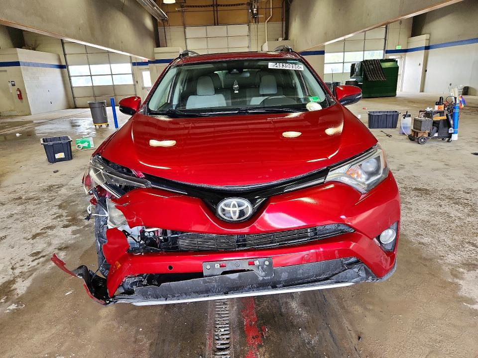 Photo 5 from auction – 2018 TOYOTA RAV4 with VIN JTMRFREV1JD223043